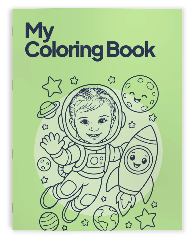 The printed coloring book: “My Coloring Book” on the cover above the girl drawn as an astronaut