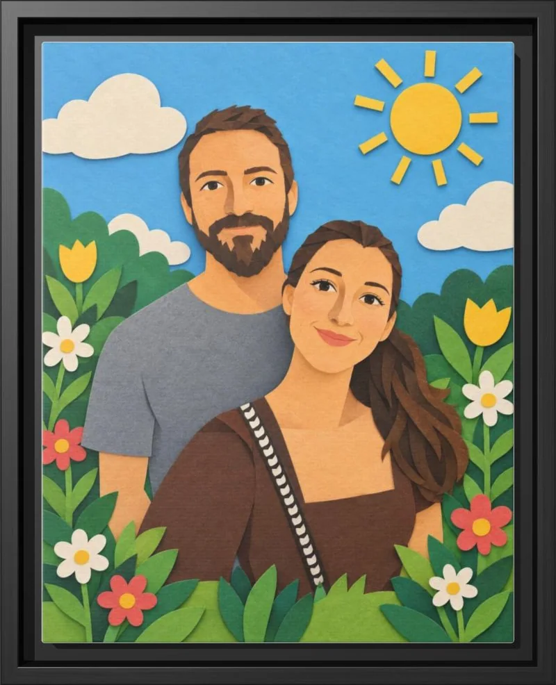 A couple rendered as a layered cut-paper collage among paper flowers, in a black floating frame