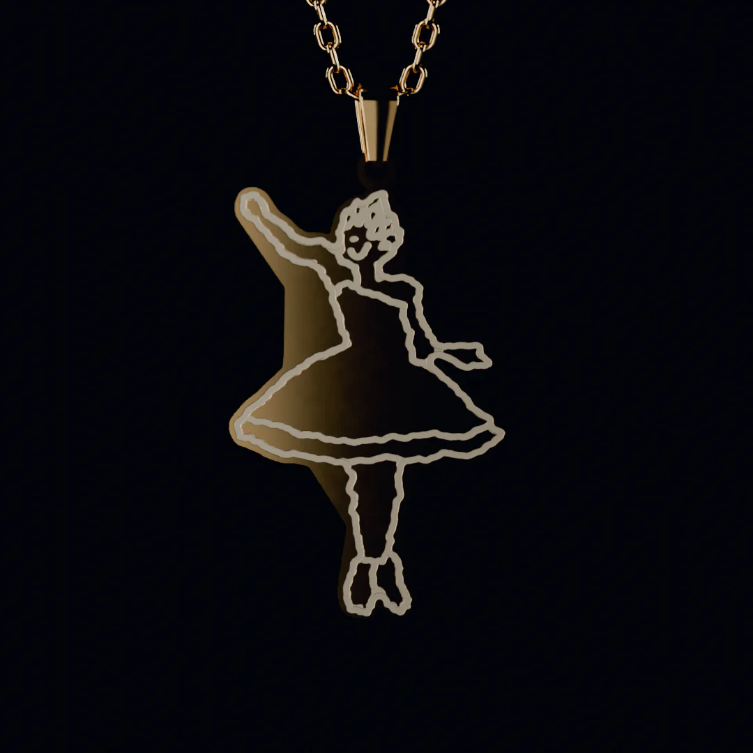 The ballerina drawing as a gold pendant cut to its shape and engraved, catching a raking light in the dark
