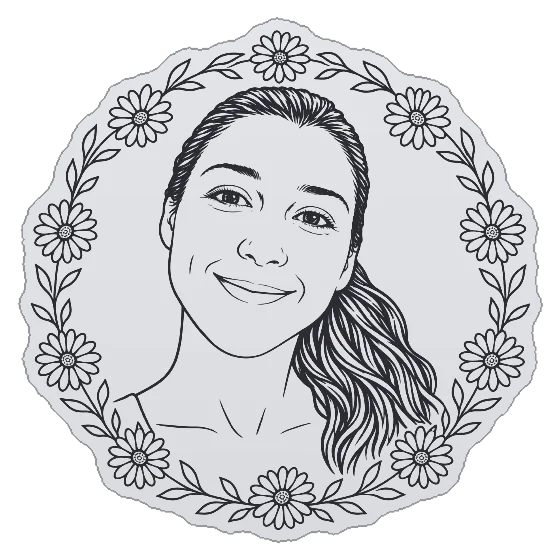 A woman’s face in fine line, ringed by a wreath of birth-month flowers, as an engraved pendant