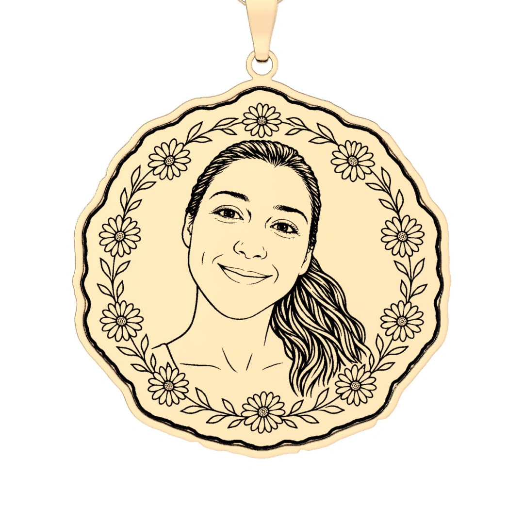 A woman’s face in fine line, ringed by a wreath of birth-month flowers, printed in black line on a gold plated pendant