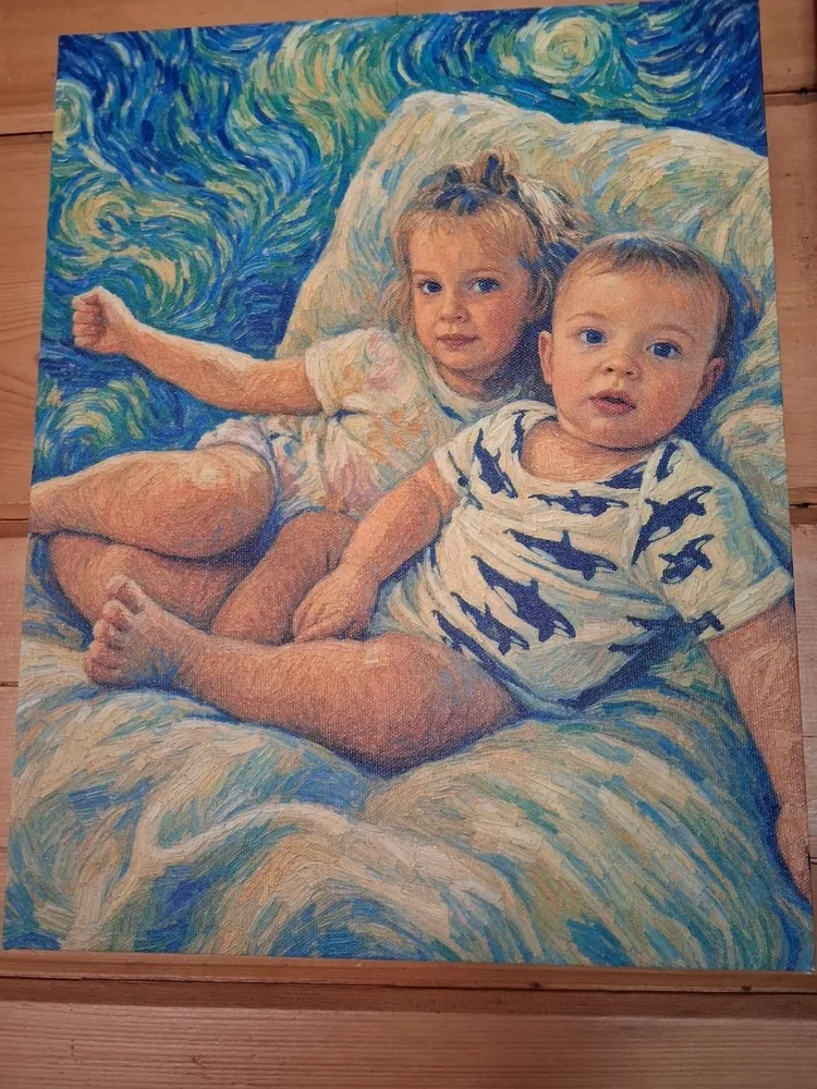 A custom canvas portrait of two young siblings painted in a swirling, starry post-impressionist oil style, propped on a wood plank floor