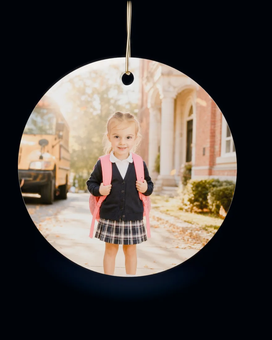 Back to School printed on a round ceramic Christmas ornament
