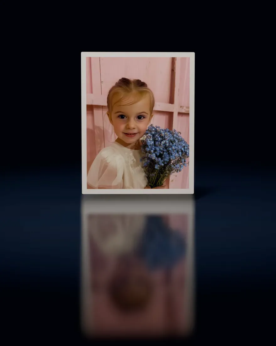 A photo of a little girl holding blue flowers turns over and becomes her painted portrait as a princess, then with a unicorn, as a mermaid and as a fairy
