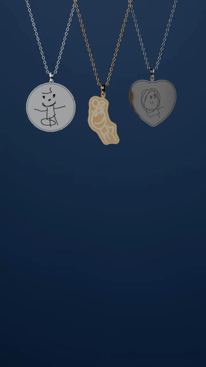 Three pendants made from children's drawings hang in front of a softly lit navy wall and turn in the light: a sterling circle with a stick figure in black line, a gold pendant cut to the outline of a little figure and engraved, and a steel heart with a girl with big hair in black line