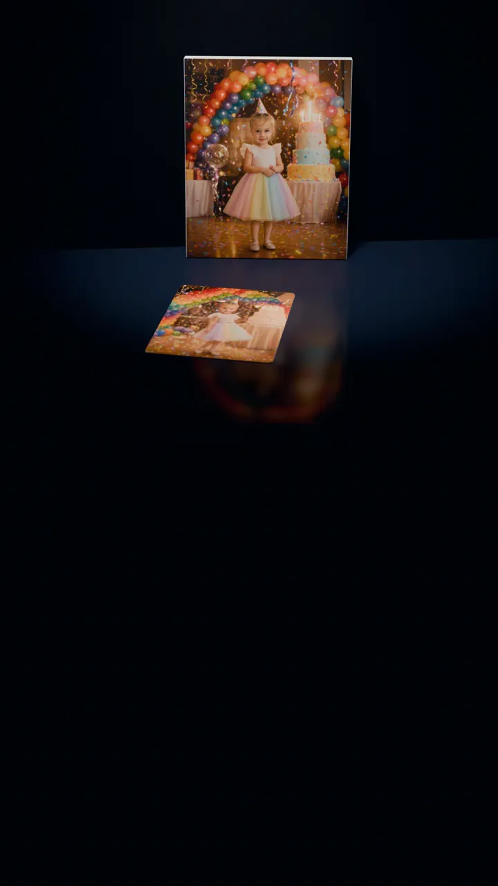 Two Birthday Bash portraits in a dark room: one on a gallery canvas leaning against the wall, the other on a 30-piece puzzle in front of it, a piece lifting out of its slot, turning over and settling back