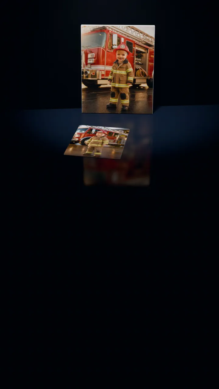 Two Fire Rescue portraits in a dark room: one on a gallery canvas leaning against the wall, the other on a 30-piece puzzle in front of it, a piece lifting out of its slot, turning over and settling back